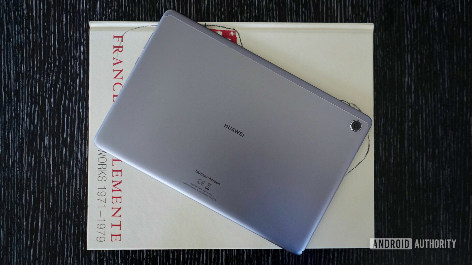 Photo of the backside of the HUAWEI MediaPad 5 Lite placed on art album