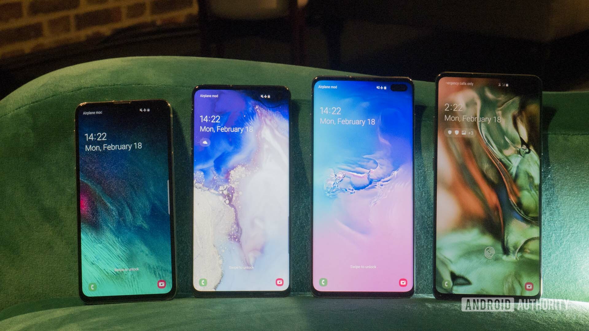 Front side photo of the Samsung Galaxy S10, S10e, S10 Plus, and S10 5G next to each other with screens turned on.