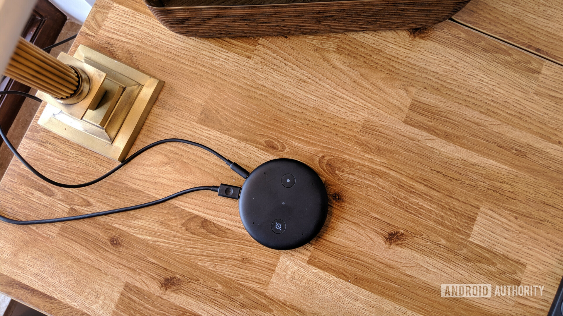 Photo of a connected Amazon Echo Input 2 on a wooden table.