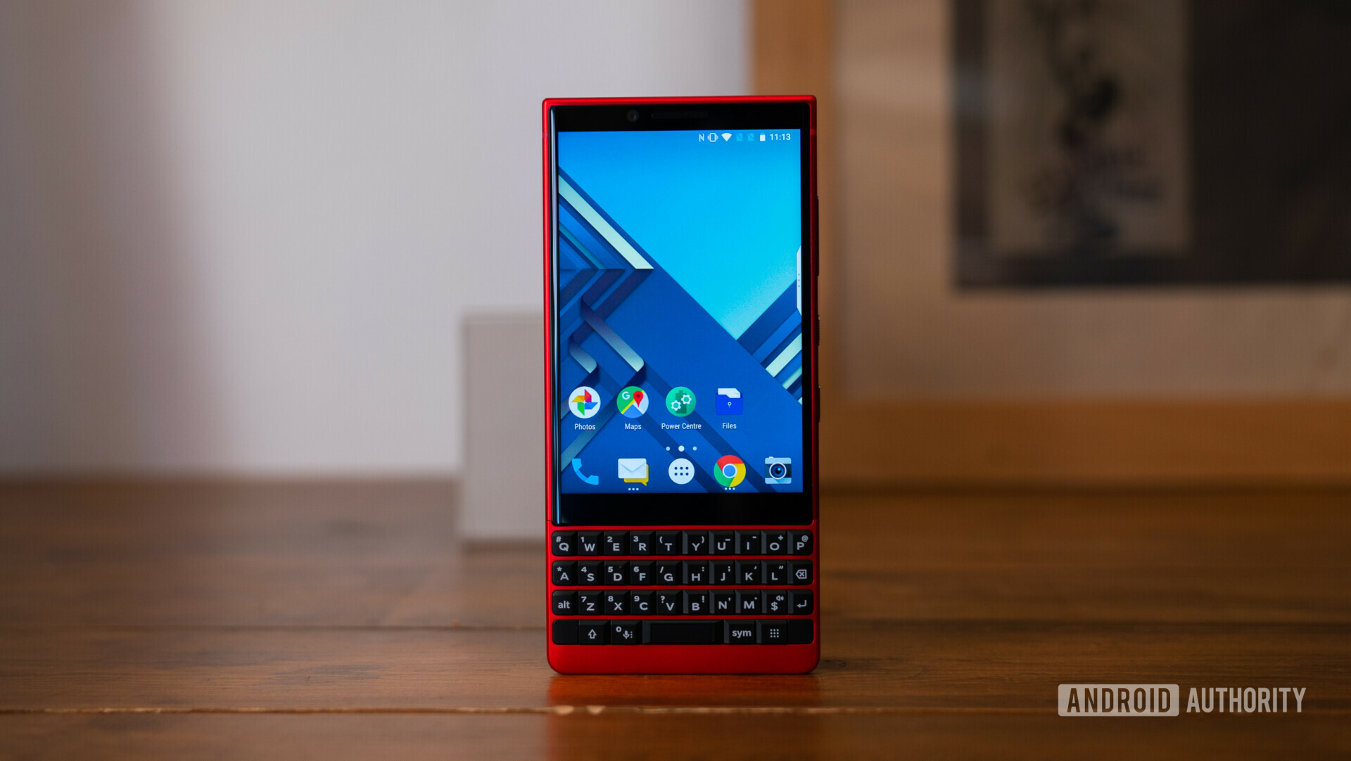 Frontside photo of the Blackberry KEY2 Red Edition with display turned on.