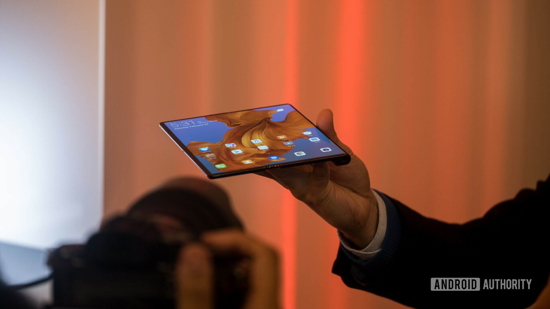 bottom side of the new HUAWEI Mate X foldable phone in tablet mode at the MWC 2019 presentation.