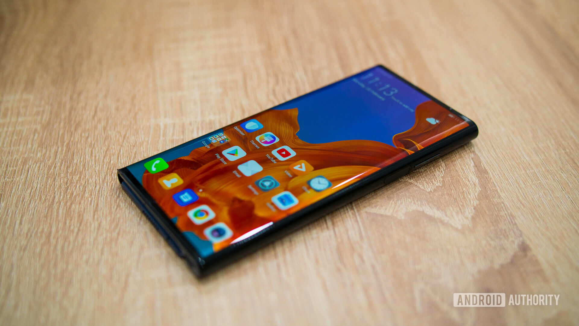 Front side photo of the 5g phone HUAWEI Mate x with display turned on.