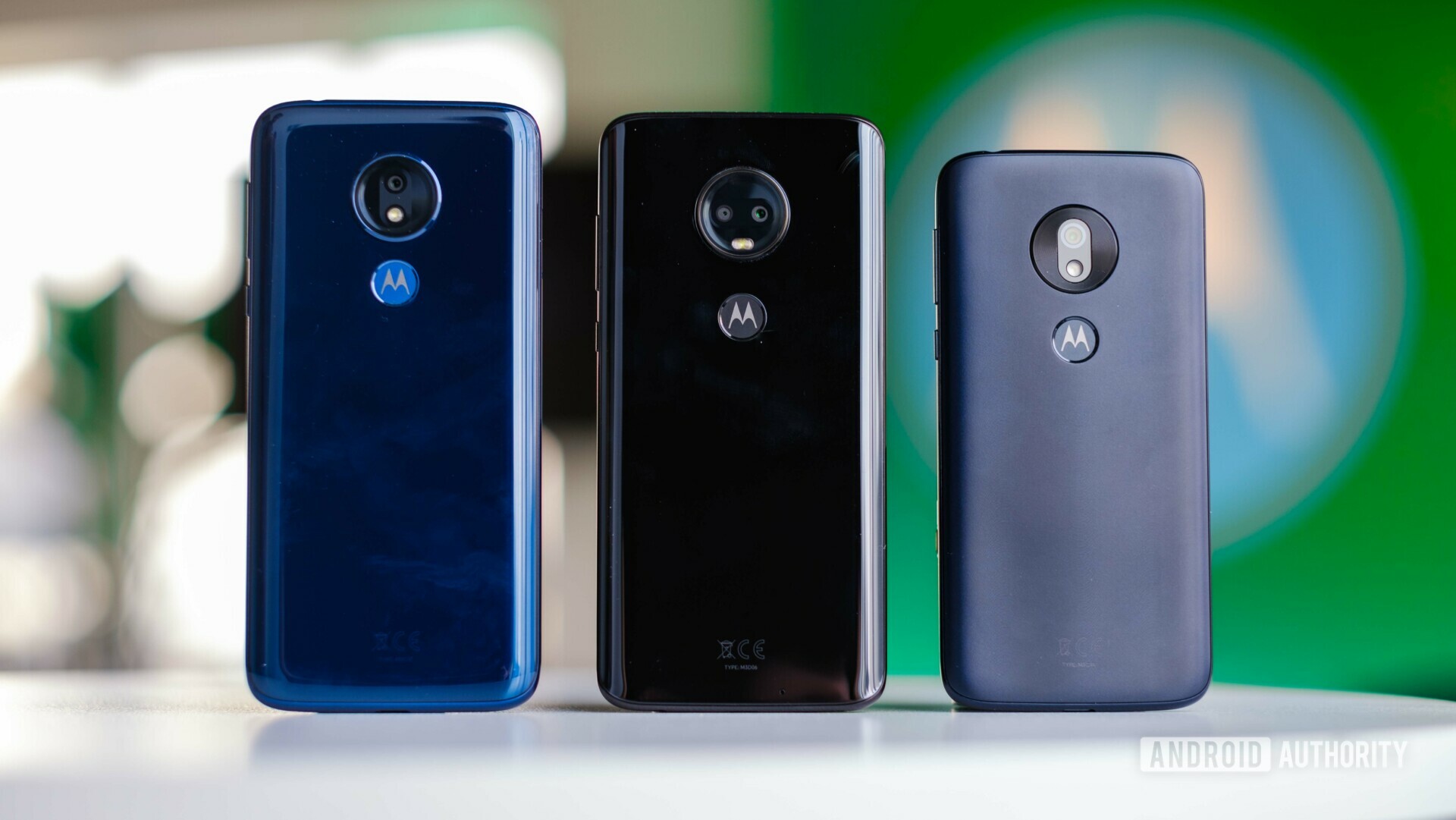 The Moto G7 family stand upright shot from behind.