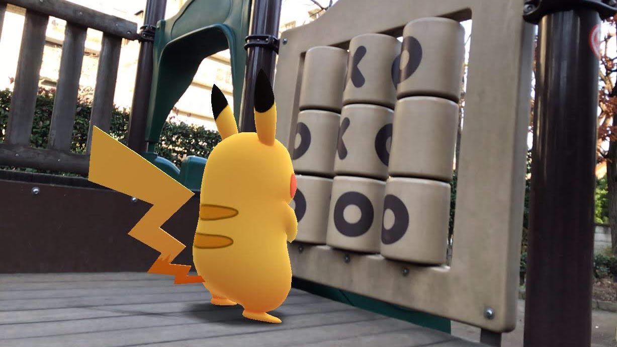 This is a photo of Pikachu at a playground for the best pokemon go iv calculators for android