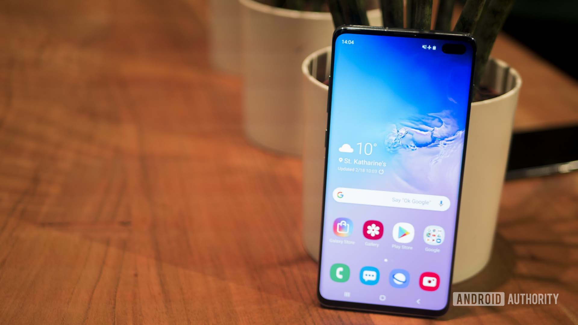 Samsung Galaxy S10 Plus Front with the default wallpaper shown.