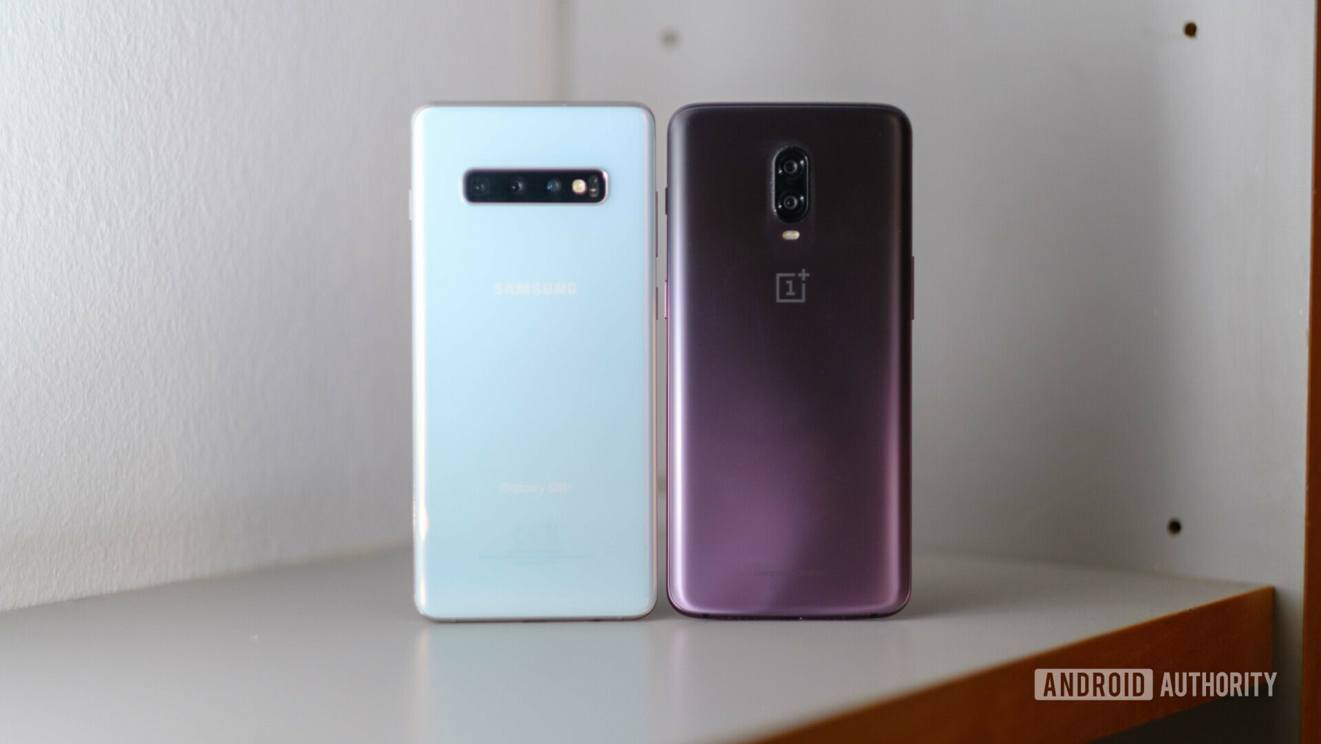 Samsung Galaxy S10 Plus vs OnePlus 6T back on shelf