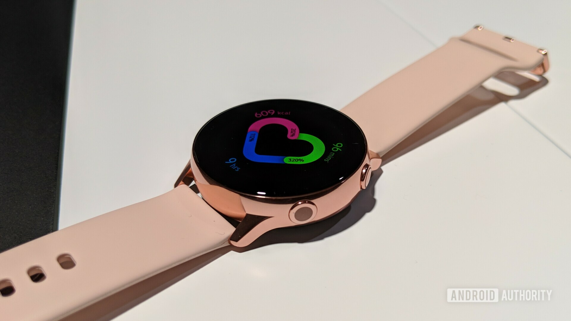 Photo of the Samsung Galaxy Watch Active placed on a table.