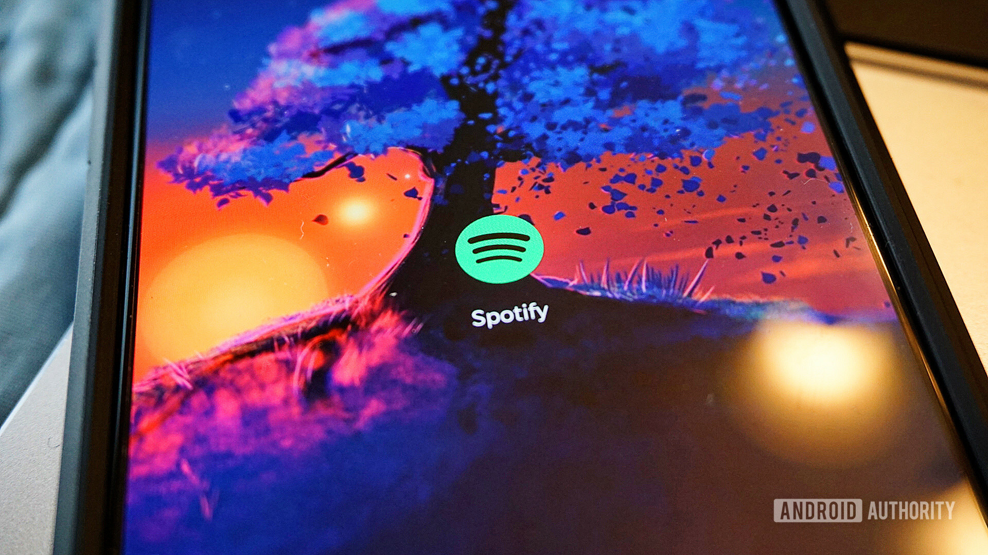 Spotify update - Spotify logo on a phone