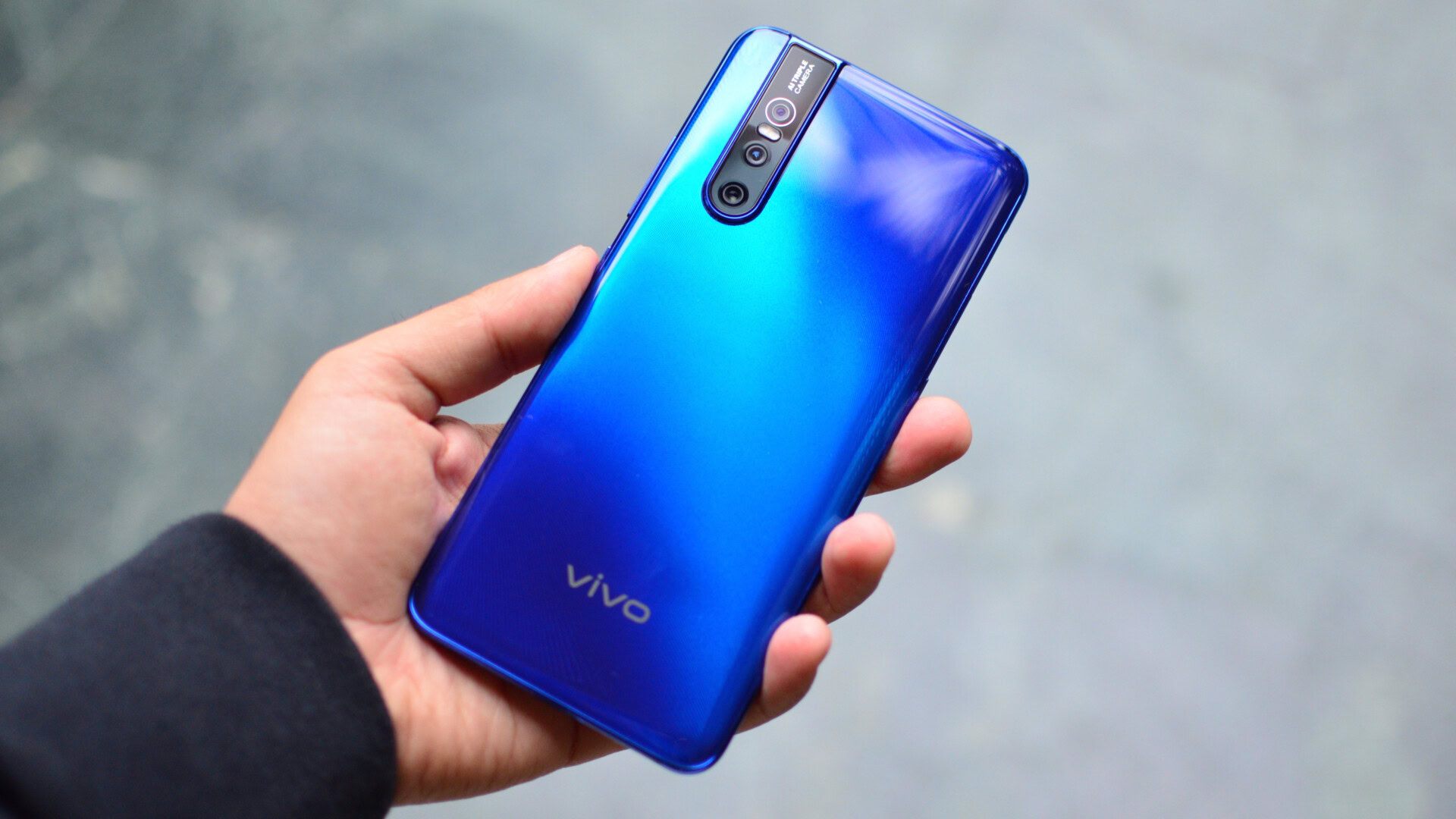 Backside photo of the vivo V15 Pro featuring tripple cameras.