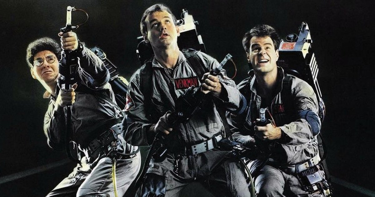 Bill Murray, Dan Aykroyd, and Harold Ramis busting ghosts in Ghostbusters - movies like stranger things
