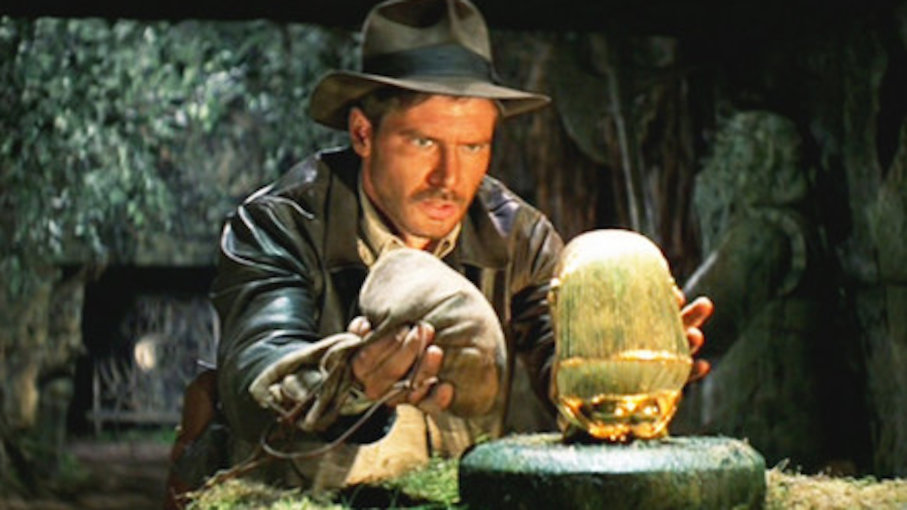 Harrison Ford como Indiana Jones en las películas de los 80 de En busca del arca perdida