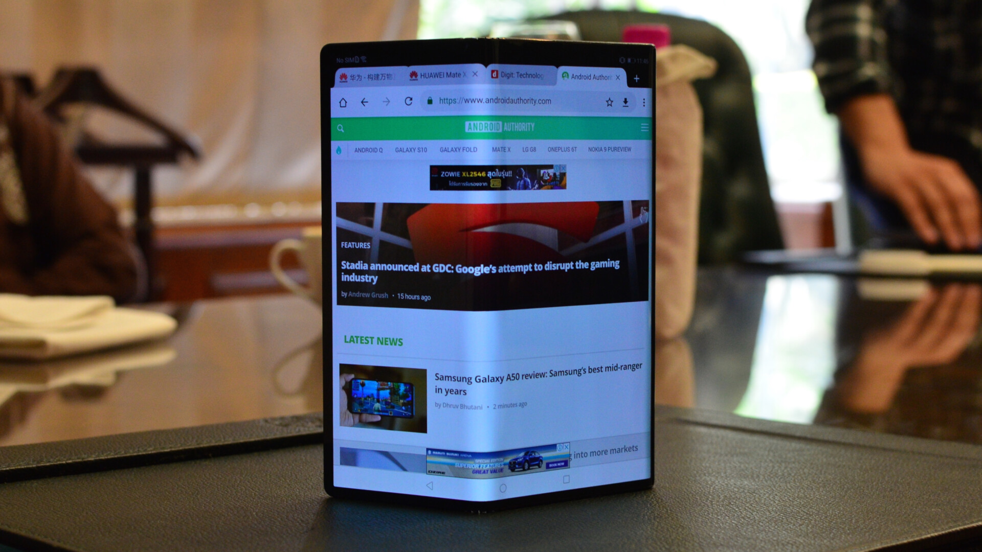 HUAWEI Mate X with Android Authority website on the display