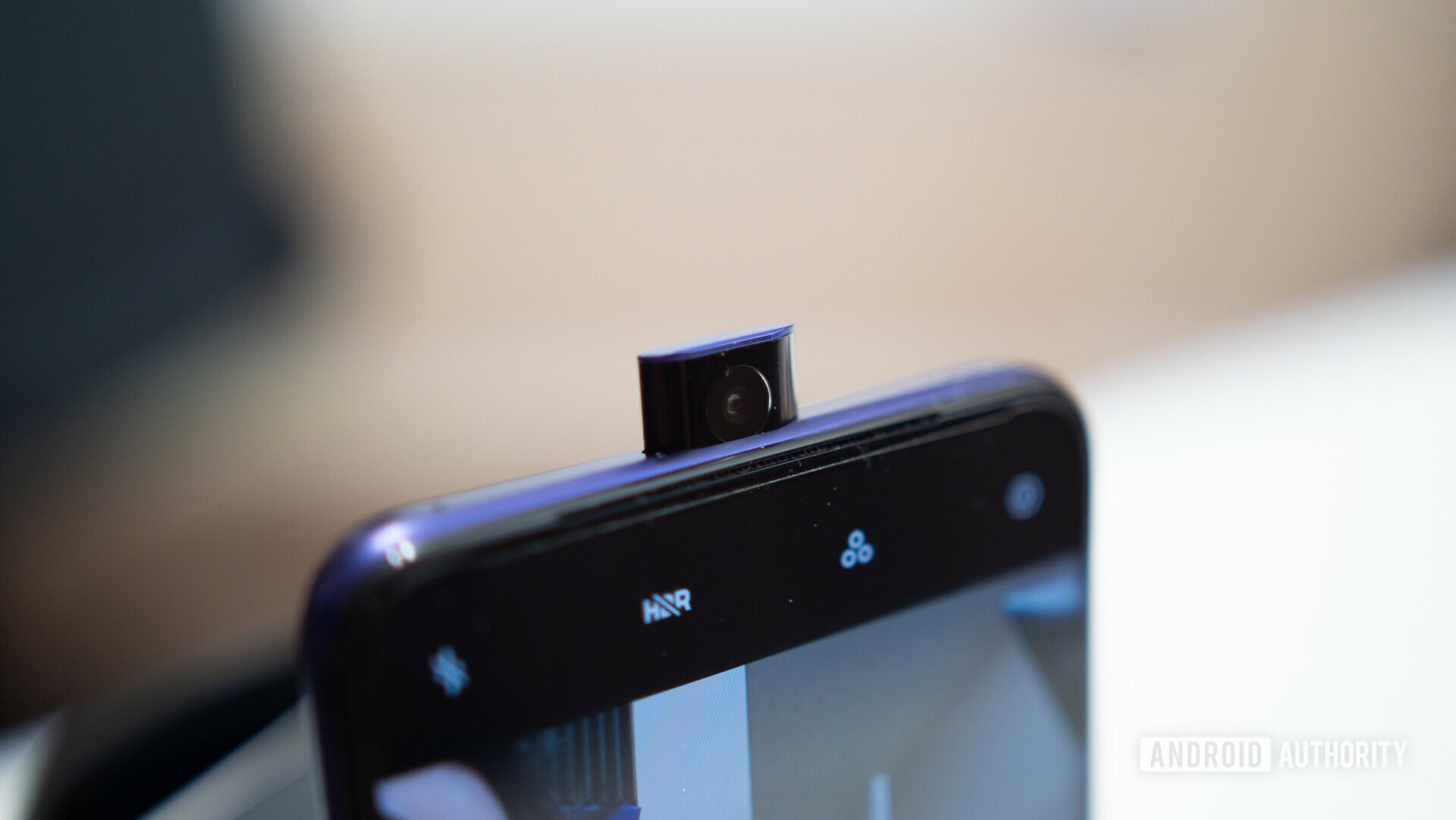 Front side view of the OPPO F11 Pro focusing on the selfie pop up camera.