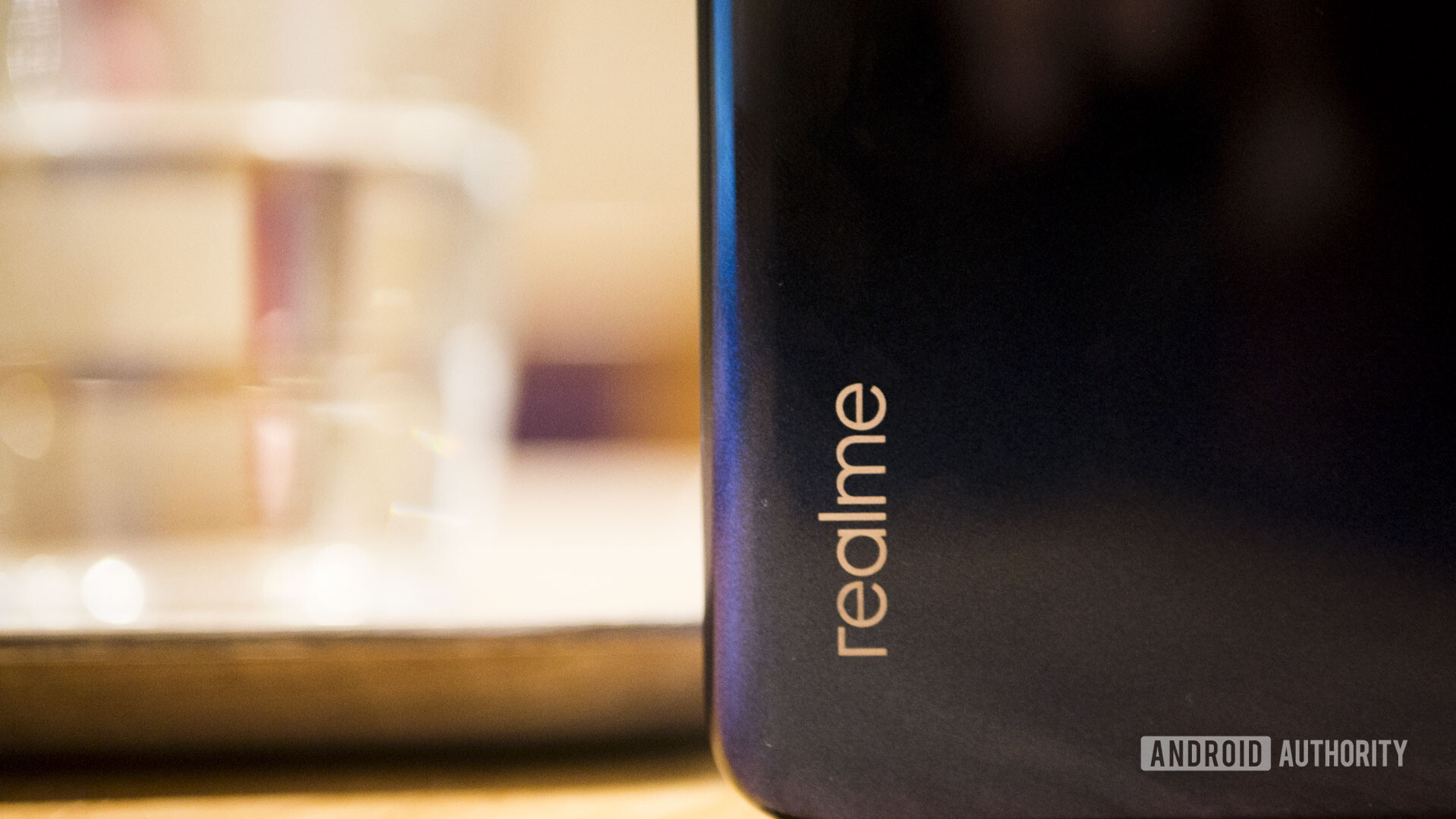 Backside of the Realme 3 focusing on the logo