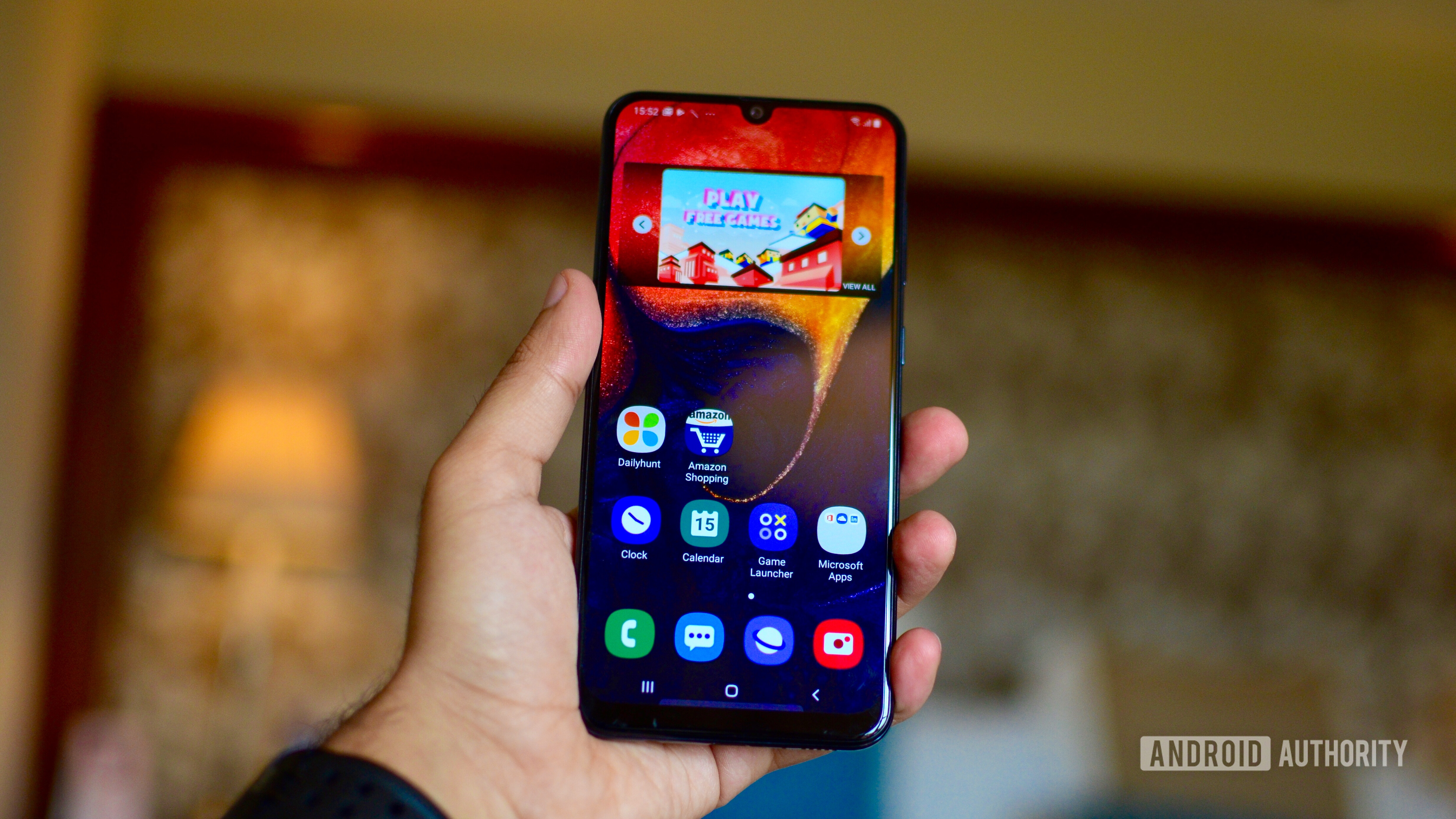 Samsung Galaxy A50 front display in hand