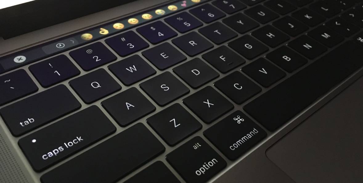 An Apple MacBook Pro keyboard and touch bar
