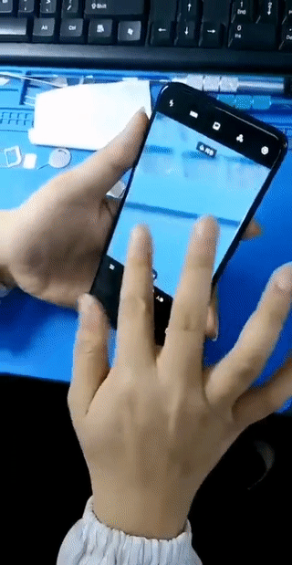 An Oppo Reno gif showing the phone's pop-up camera in motion.