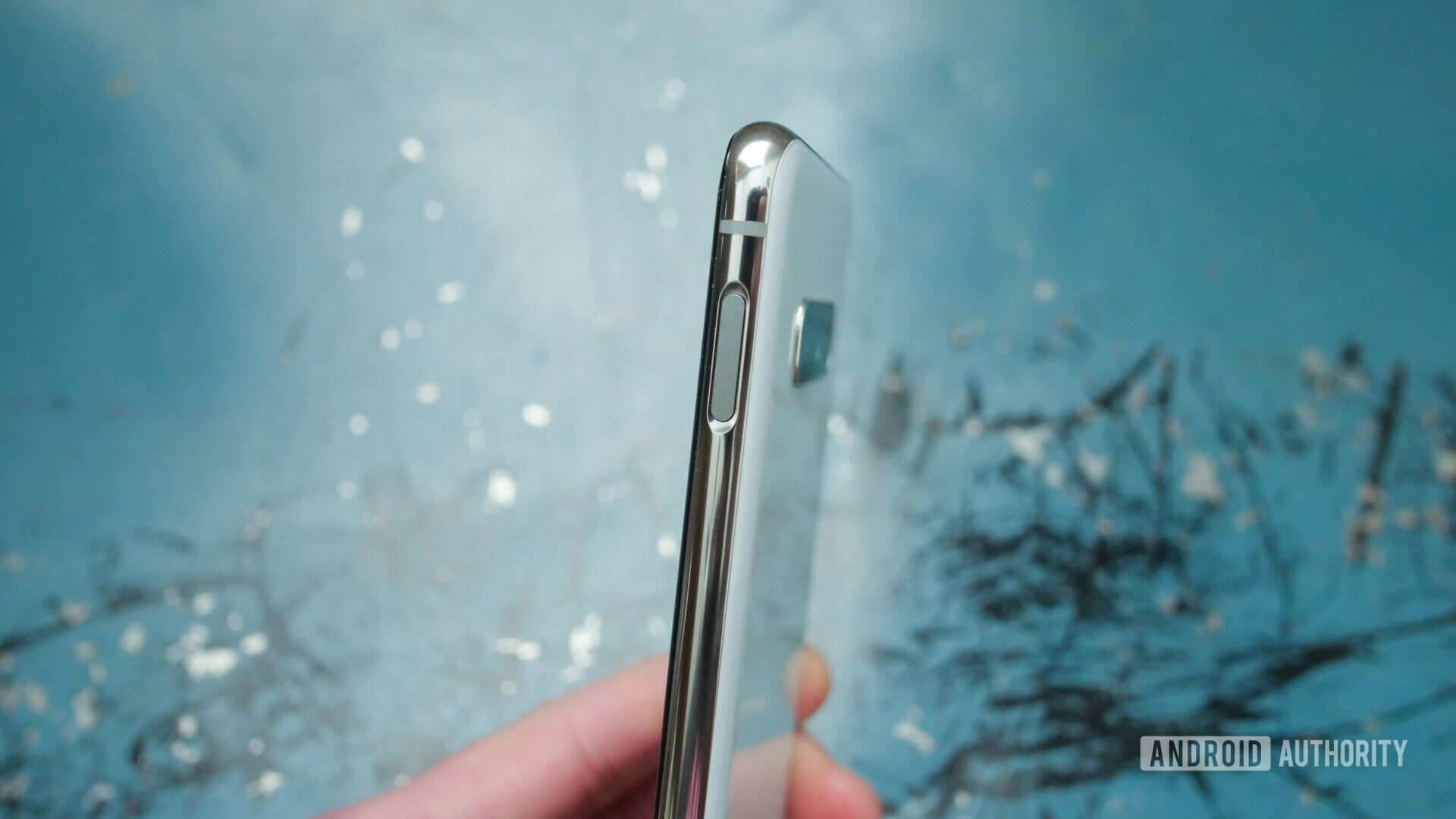 Side view of the samsung galaxy s10e focusing on the fingerprint sensor/power button.