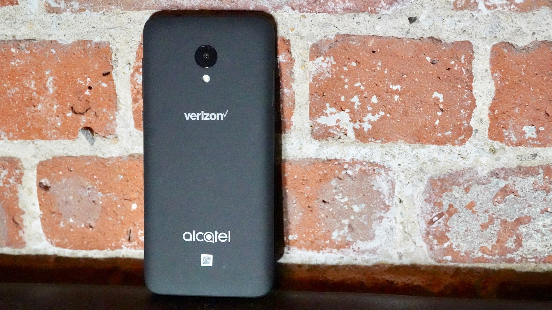 Alcatel Avalon V against brick