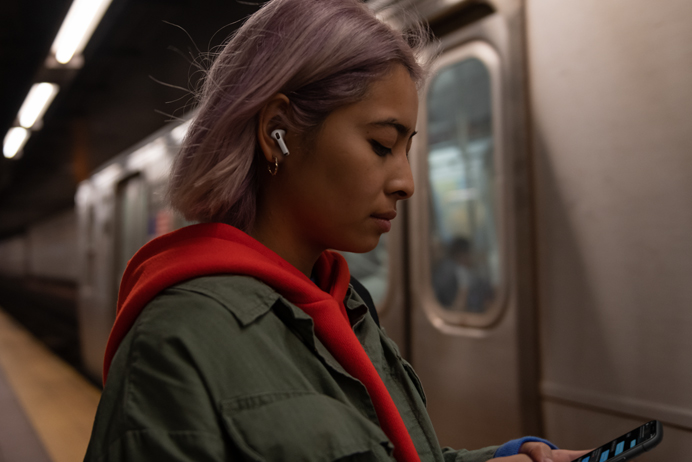 Apple AirPods Pro worn by woman