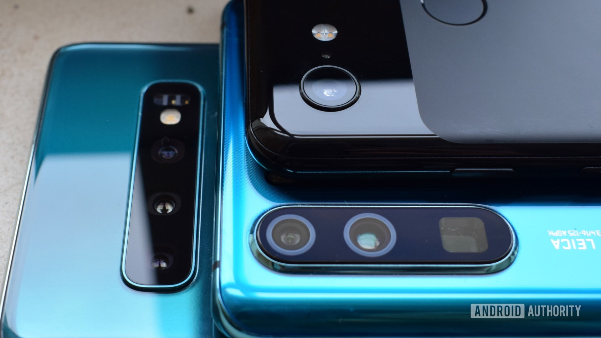Camera lenses of the Samsung Galaxy S10, Google Pixel 3, and HUAWEI P30 Pro