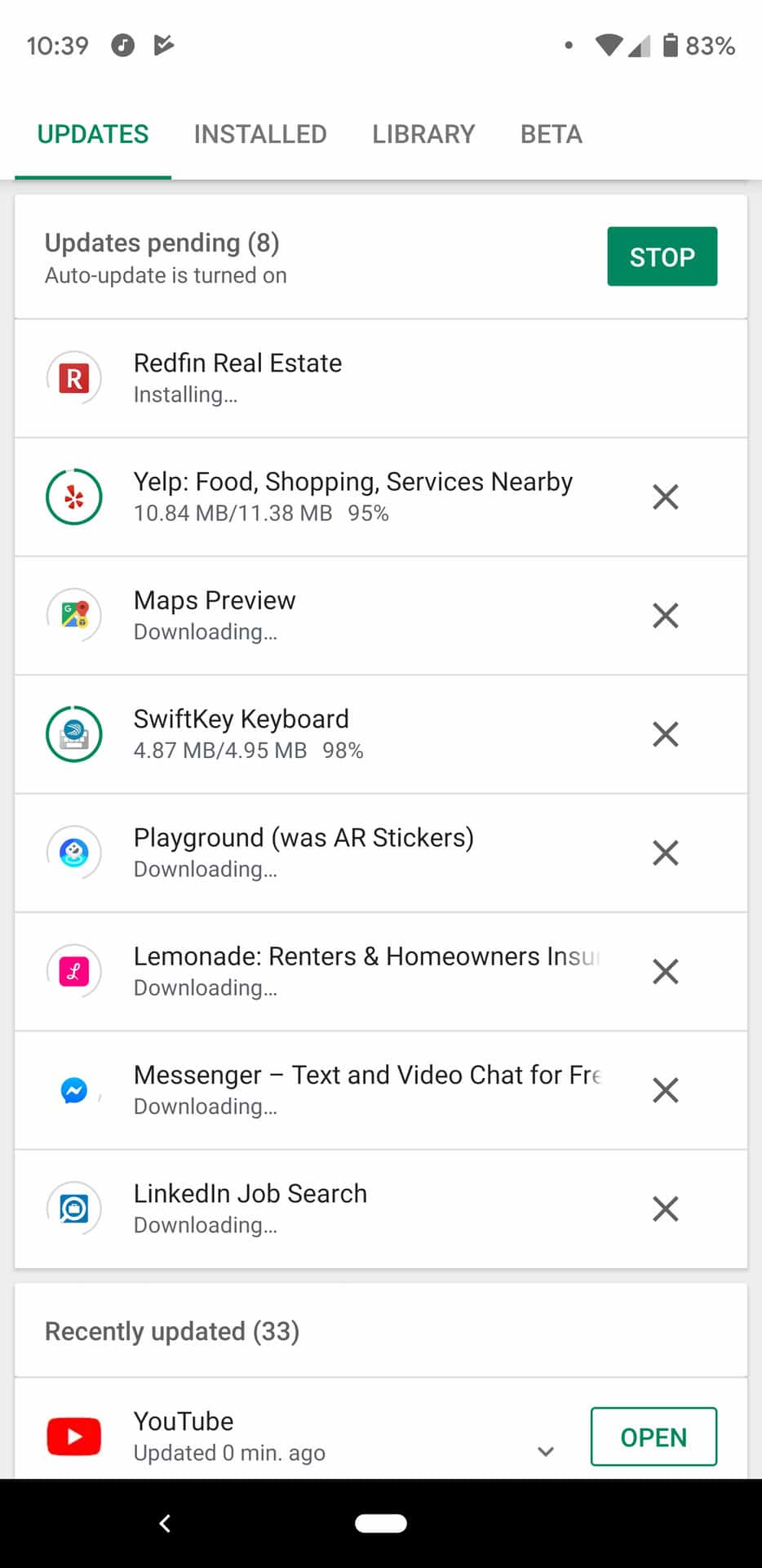 Screenshot of simultaneous app downloads in the Google Play Store.