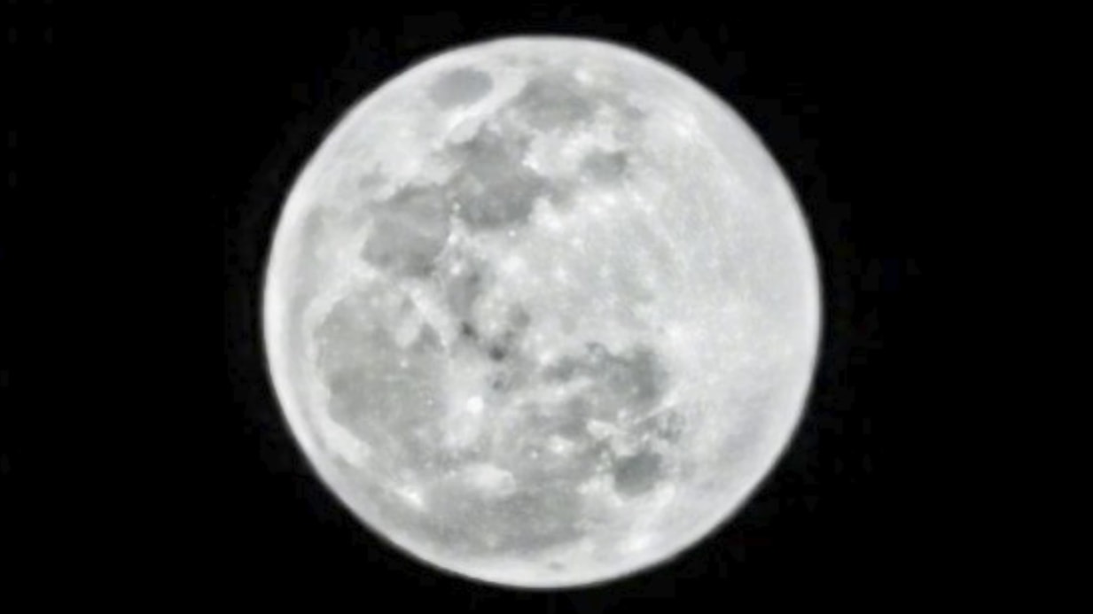 A photograph, supplied by HUAWEI, of the moon at night, allegedly photographed using a HUAWEI P30 Pro without a tripod or any additional equipment.