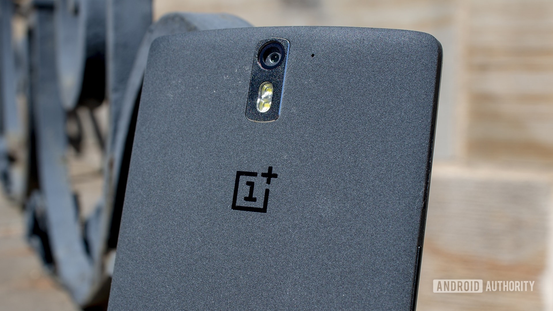 A closeup of the back of the OnePlus One showing its single rear camera.