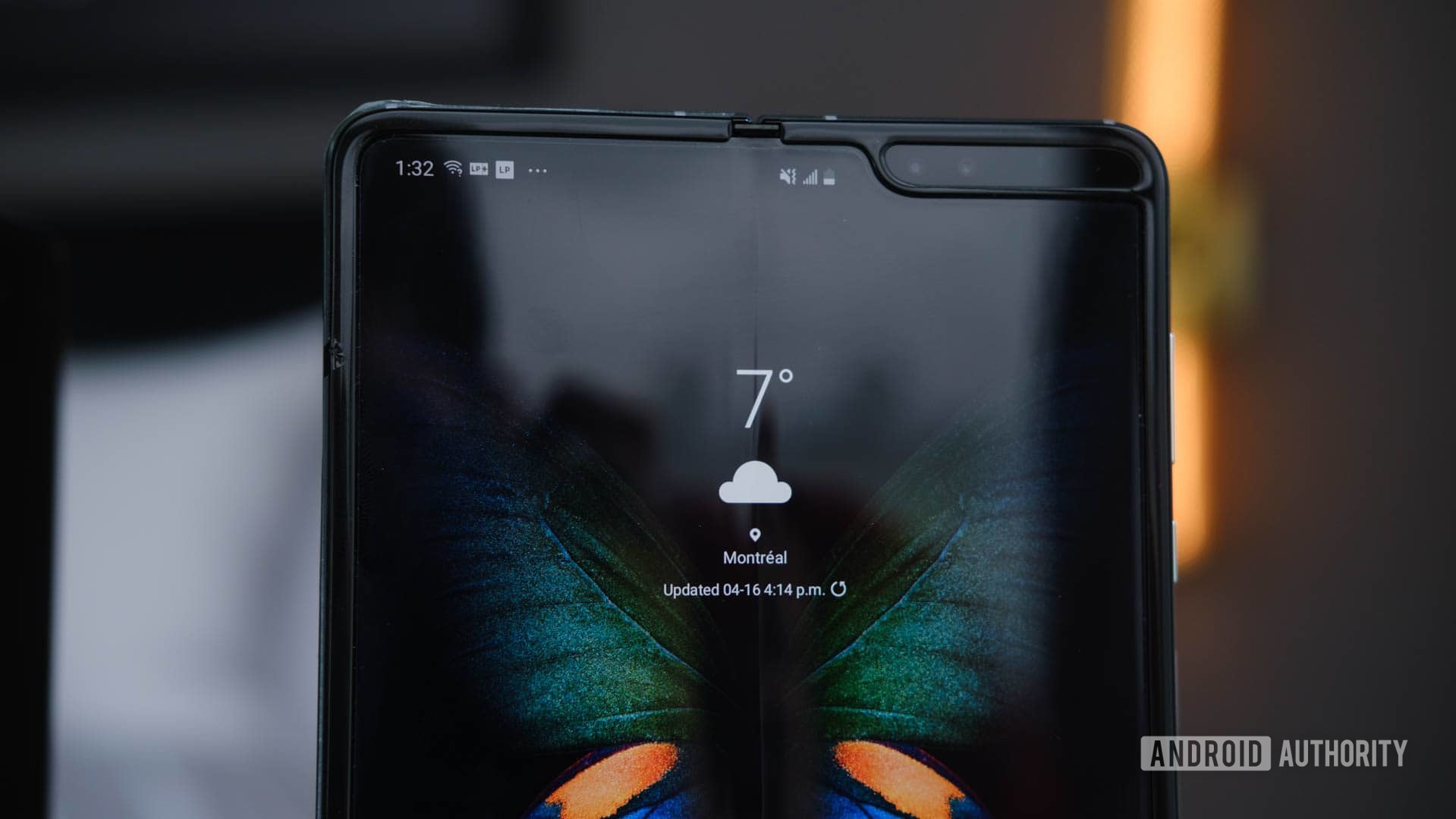 Samsung Galaxy Fold upper half tablet mode on table