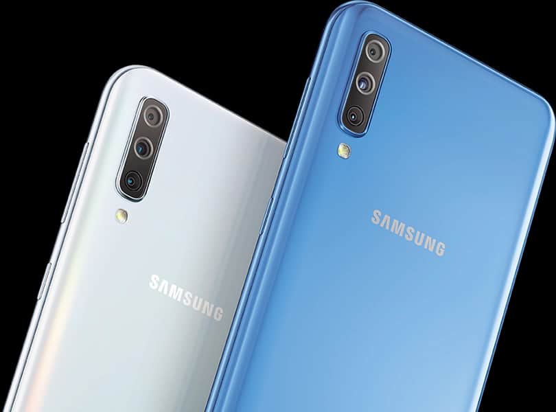 The Samsung Galaxy A70 in silver and blue from behind.