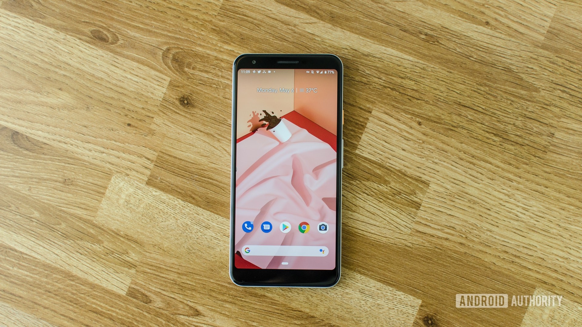Google Pixel 3a XL on desk with display
