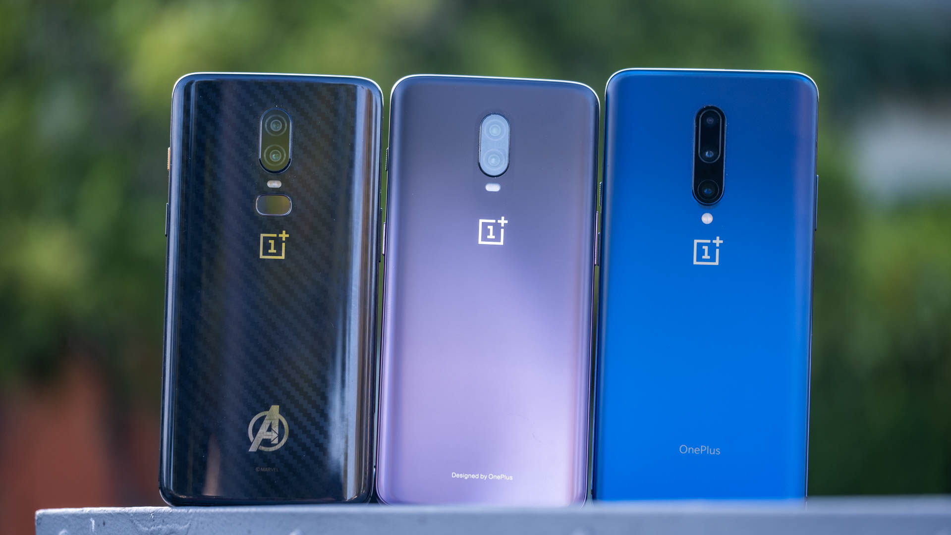 The back of the OnePlus 7 Pro, OnePlus 6T, and OnePlus 6 side by side.