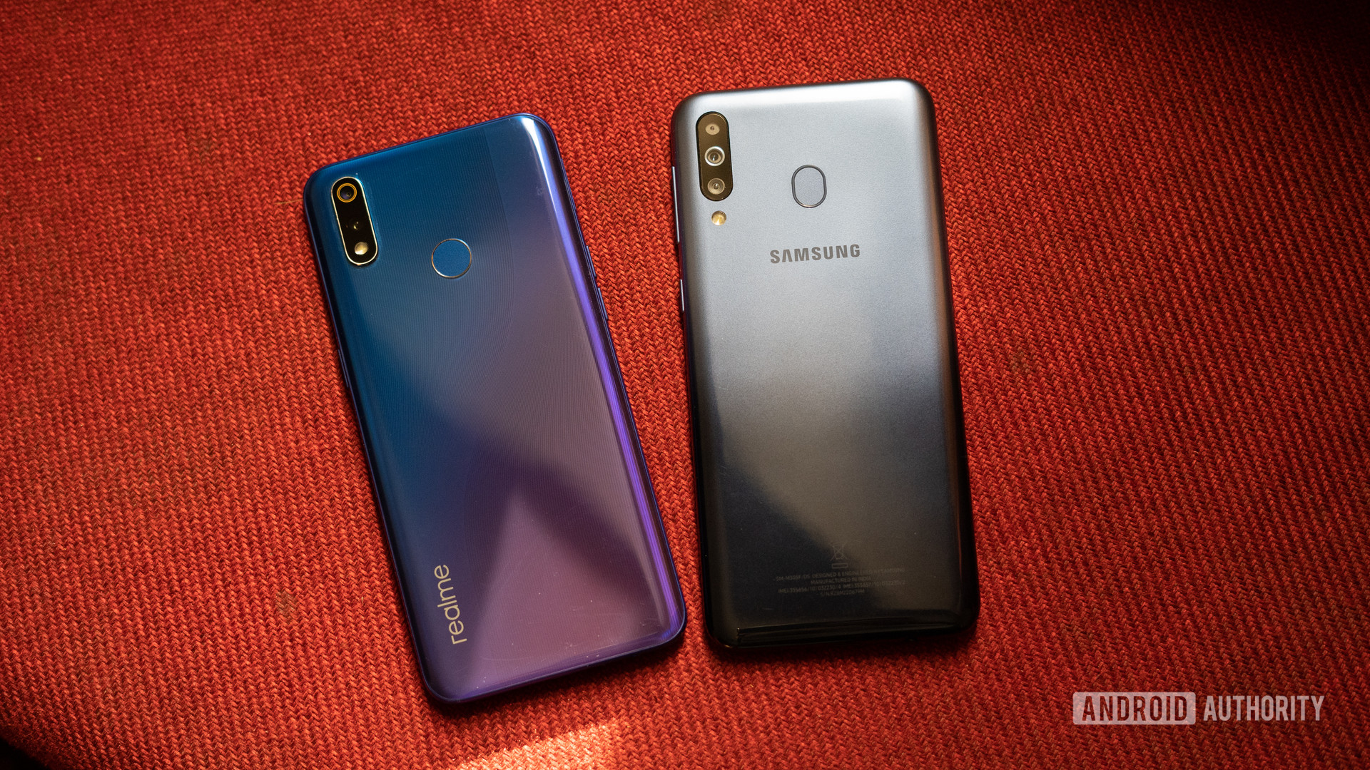 realme 3 Pro vs Galaxy M30 showing back of the phone