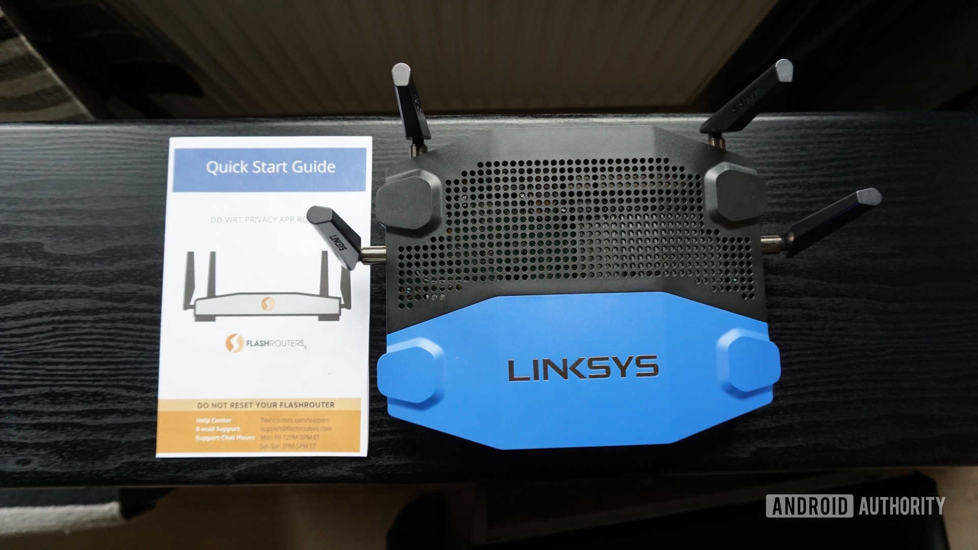 Flashrouters picture of Linksys-3200 with quick start guide