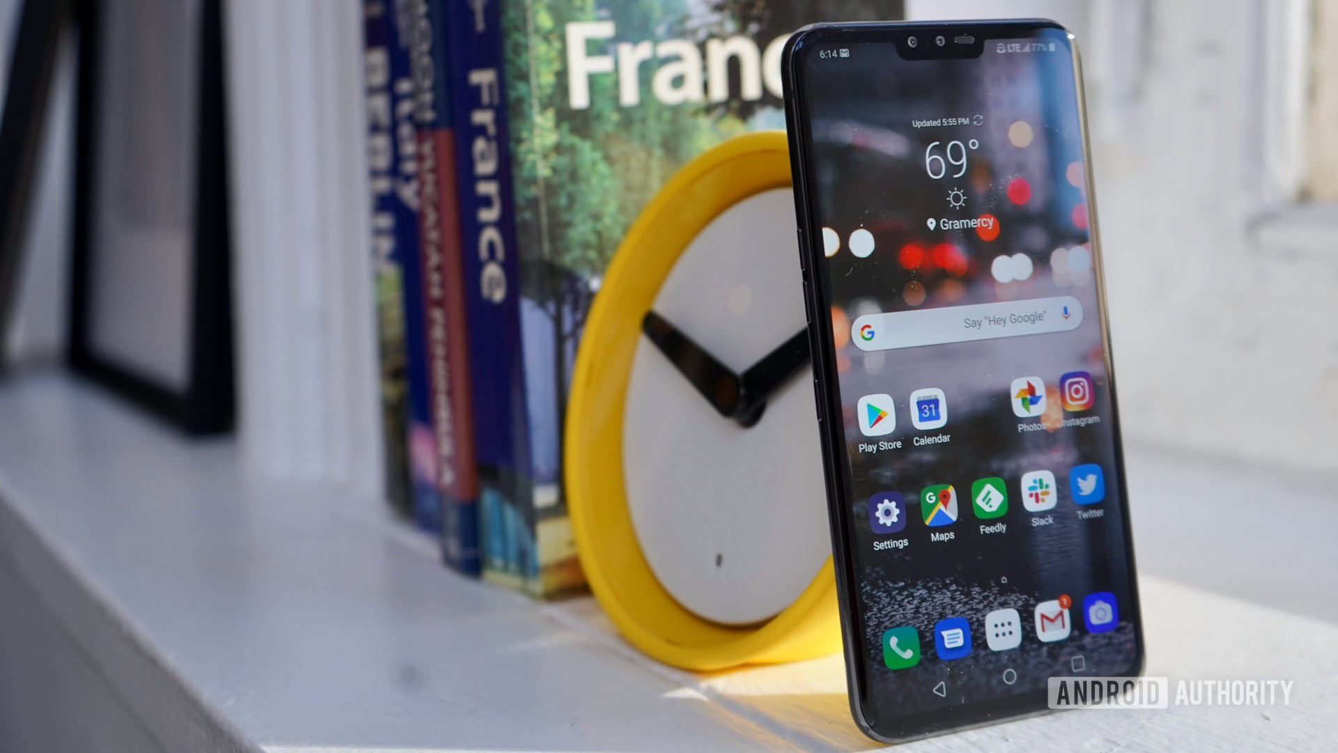 LG V50 ThinQ Review leaning on books