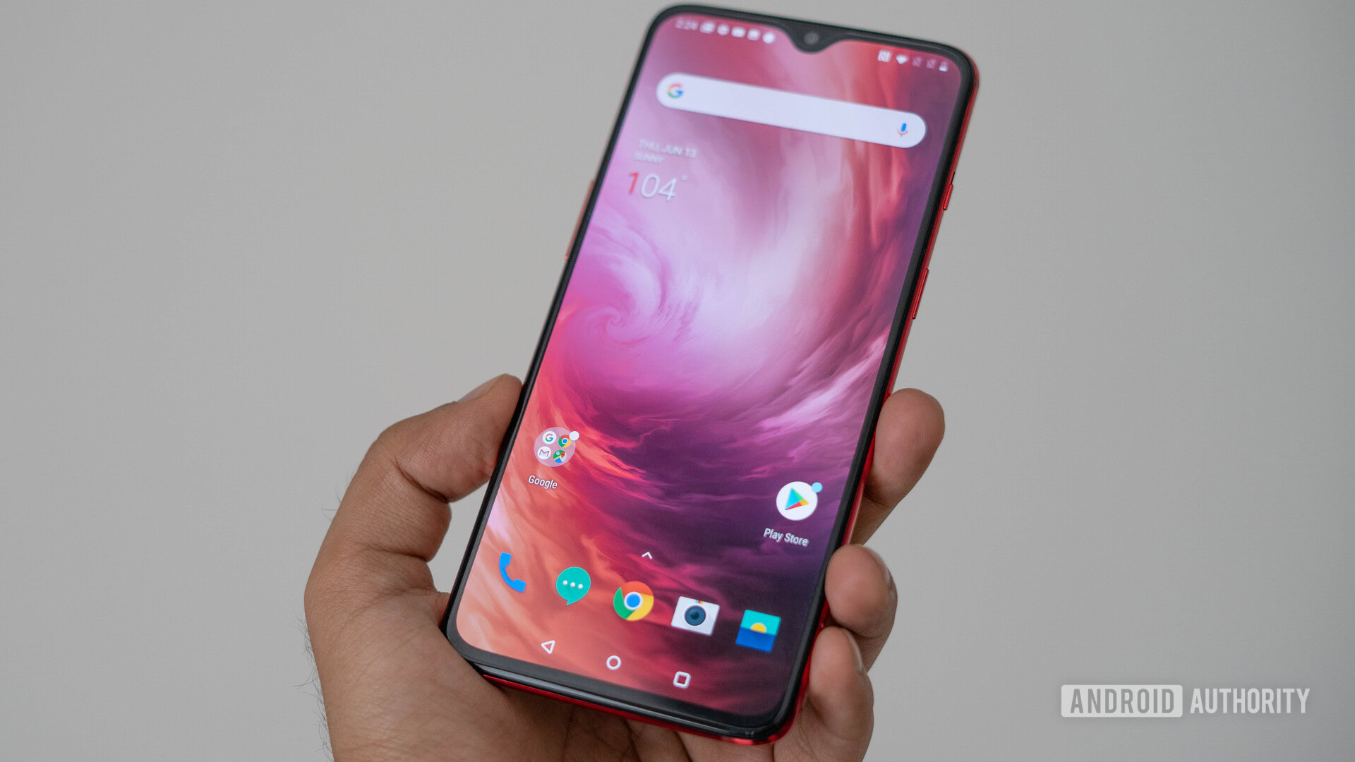 OnePlus 7 in hand showing display. OnePlus 7 versus OnePlus 6T. 