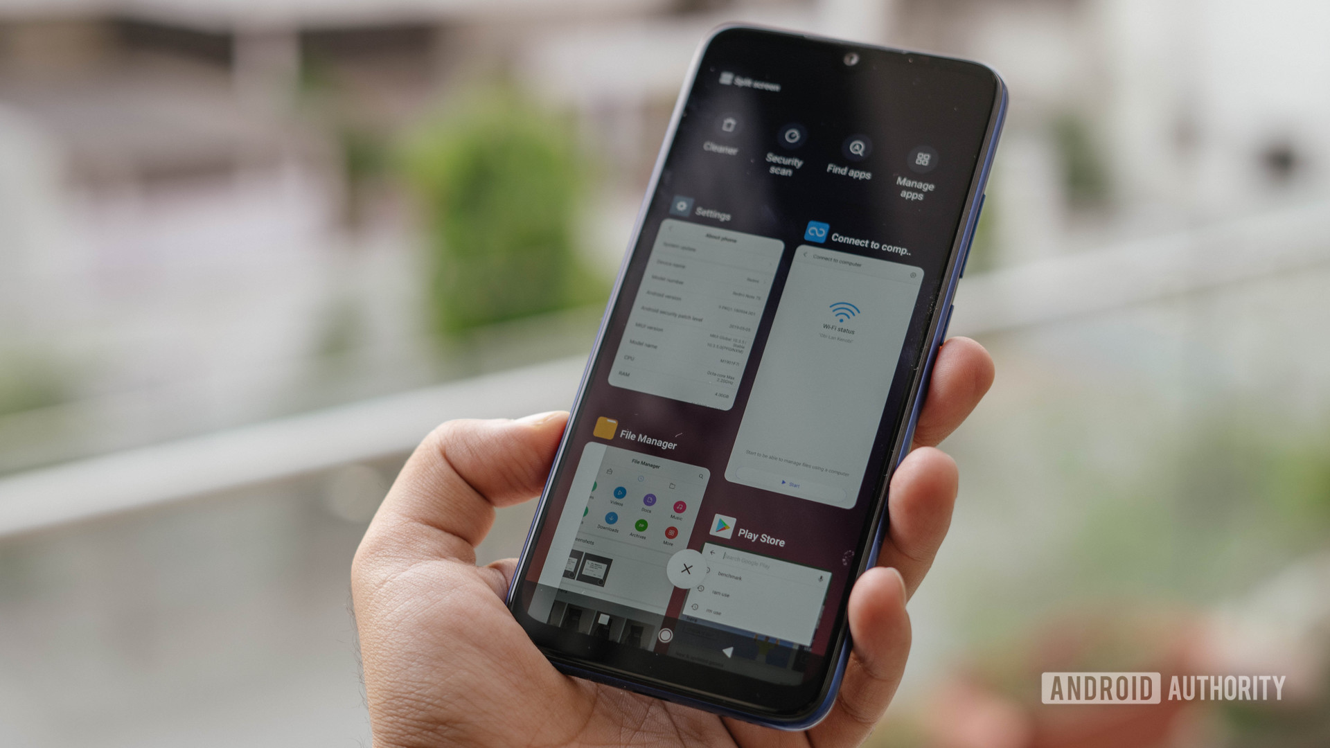Redmi Note 7S in hand multitasking menu