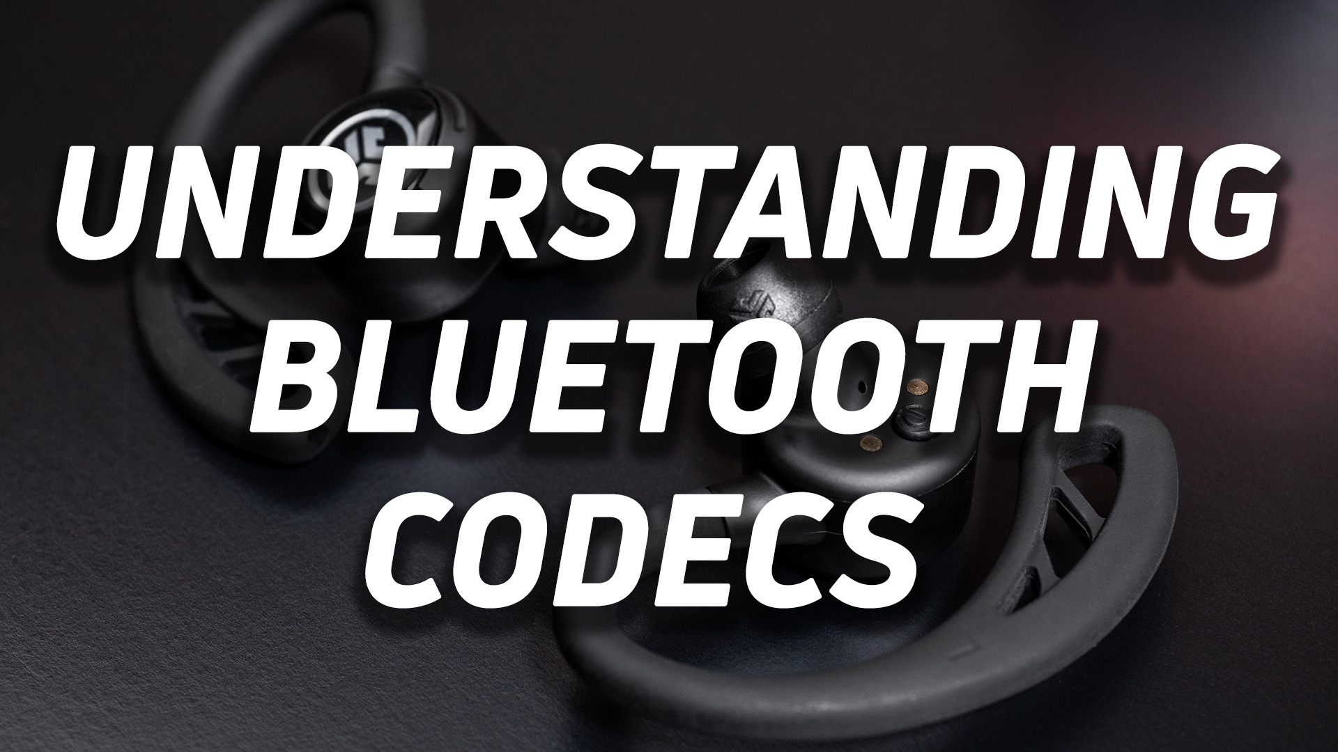 Title card which reads, "undersetanding Bluetooth codecs" overlayed atop an image of the JLab Epic Air Elite true wireless earbuds.