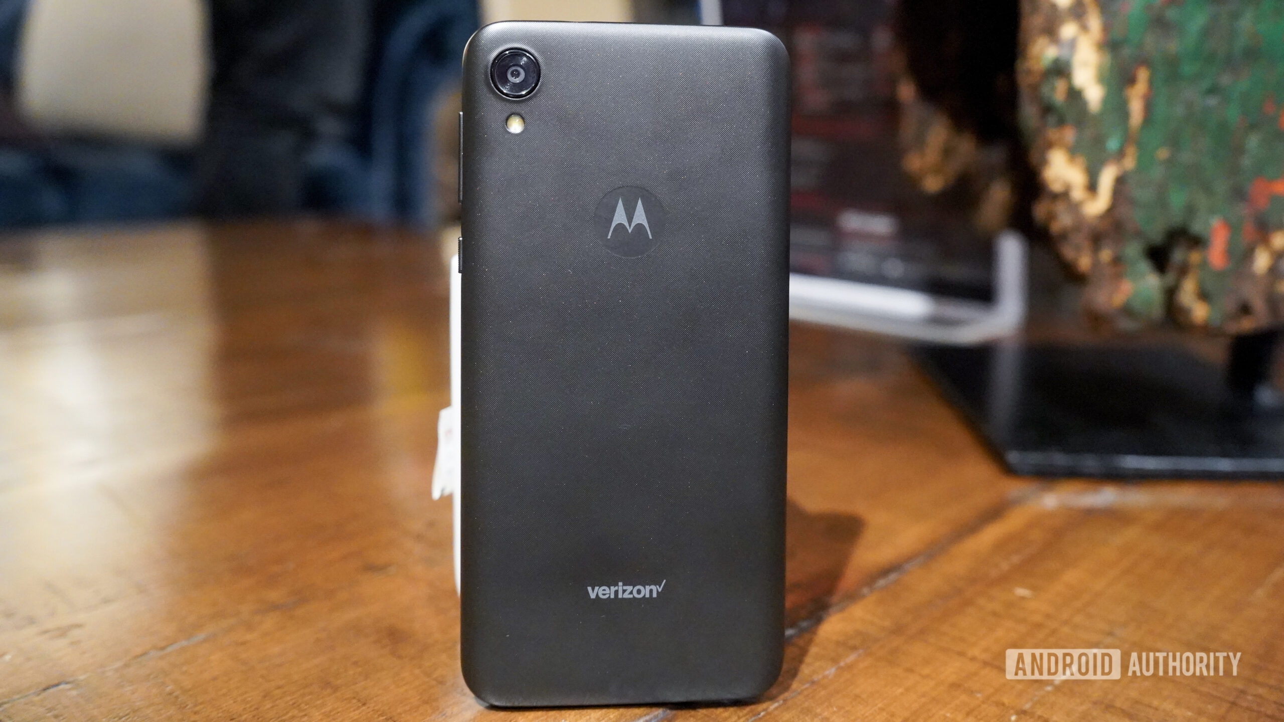 Motorola Moto E6 hands on leaning on mug