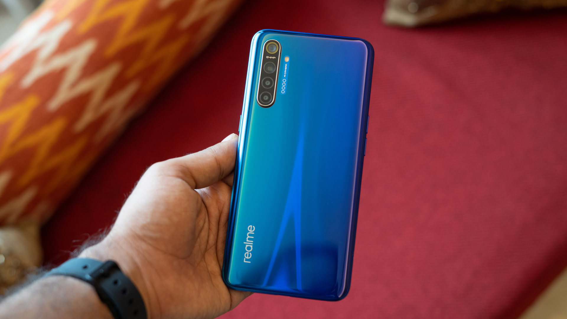 realme XT showing back gradient in hand