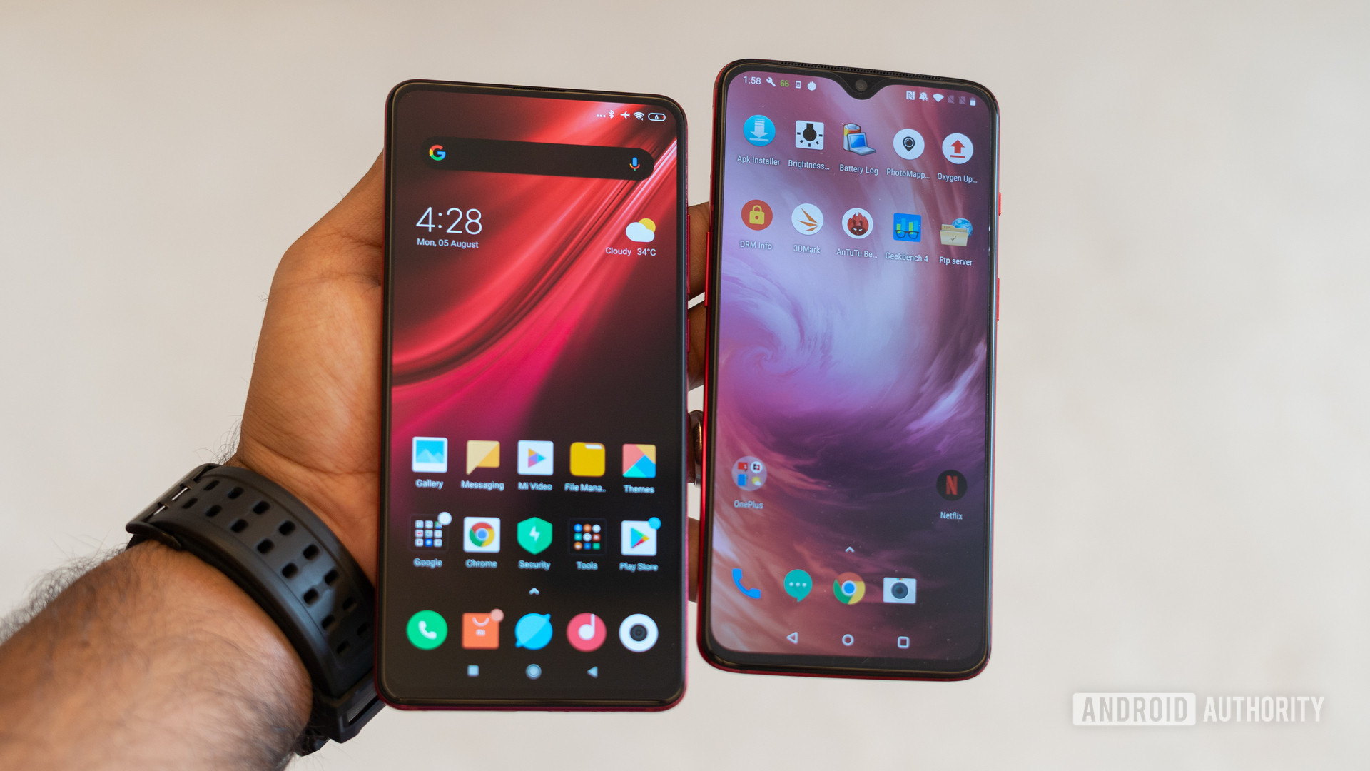 Redmi K20 Pro vs OnePlus 7 showing front display in hand