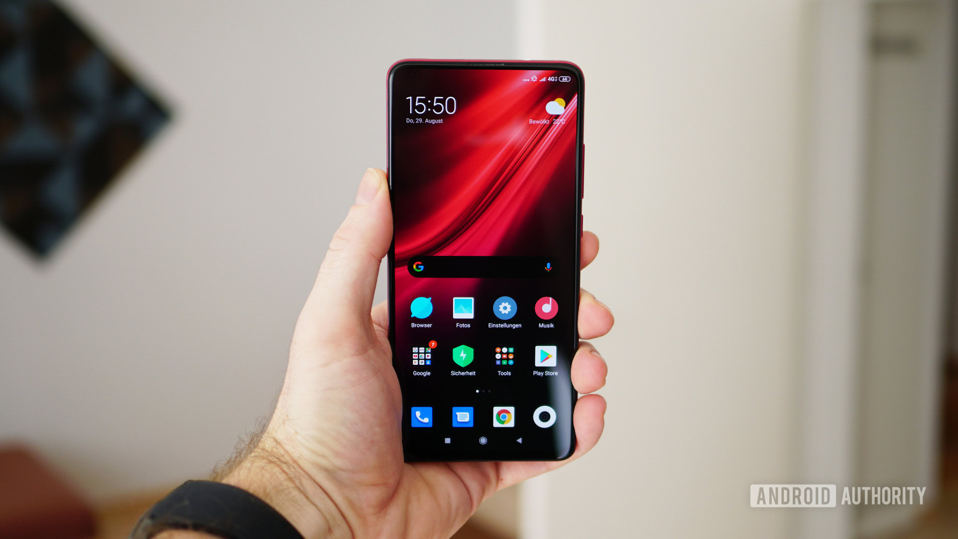 Xiaomi Mi 9T Pro red home screen in hand