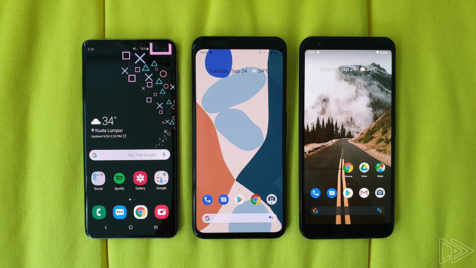 Google Pixel 4 XL between a Samsung Galaxy S10 Plus and a Google Pixel 3a XL