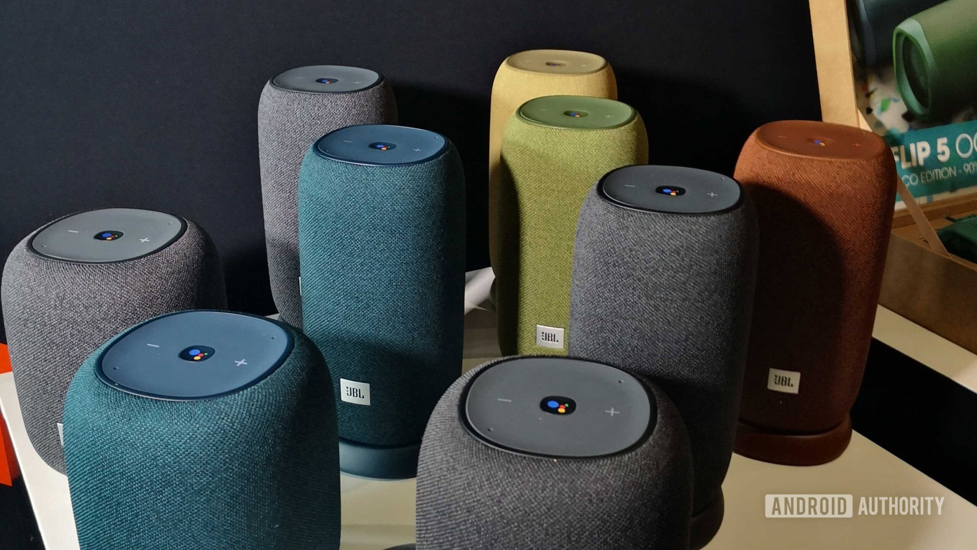 A handful of JBL speakers together.