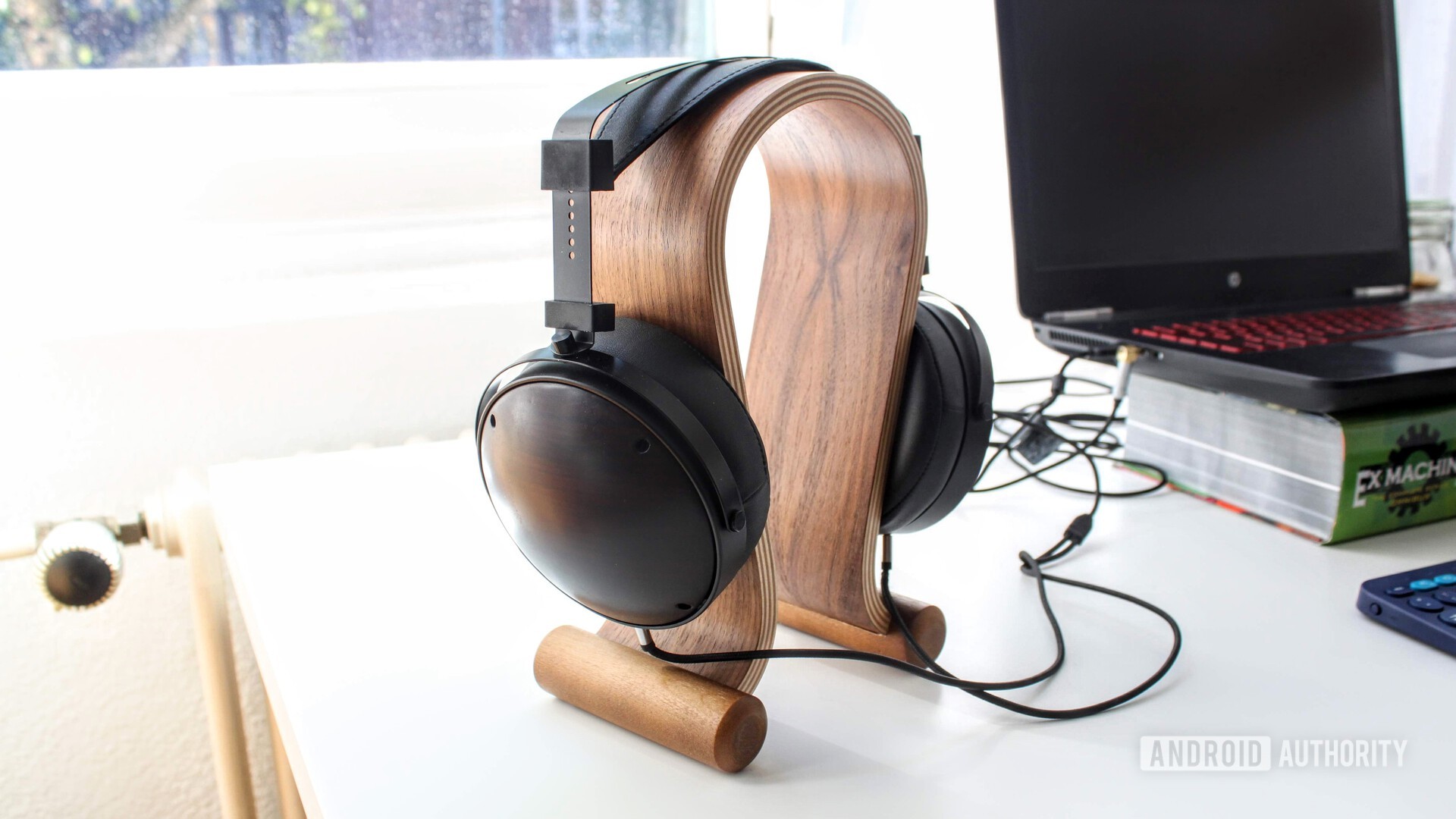 Monolith by Monoprice M1060C headphones with a headphone stand