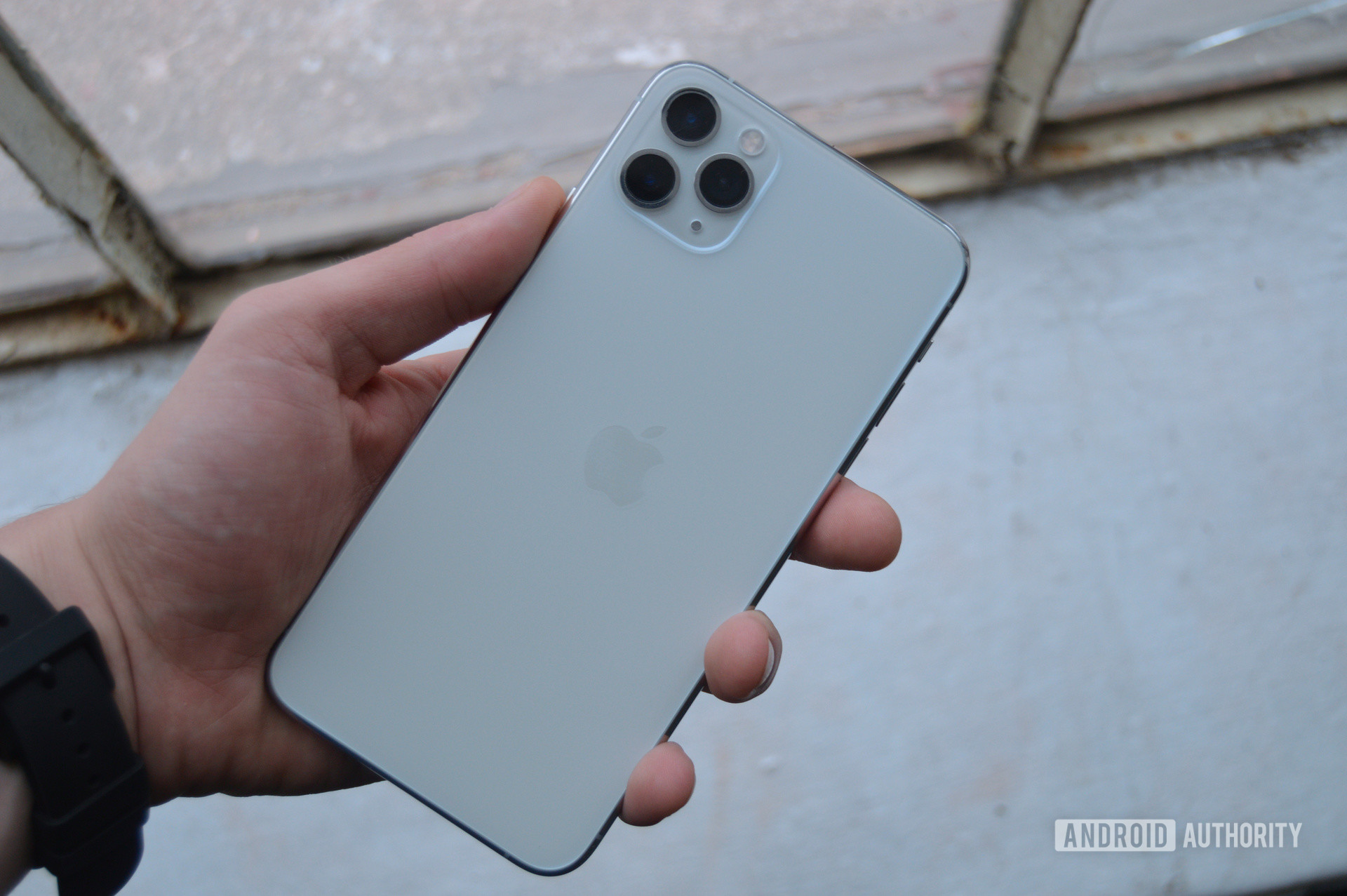 iPhone 11 Pro Max Back Cameras in Hand