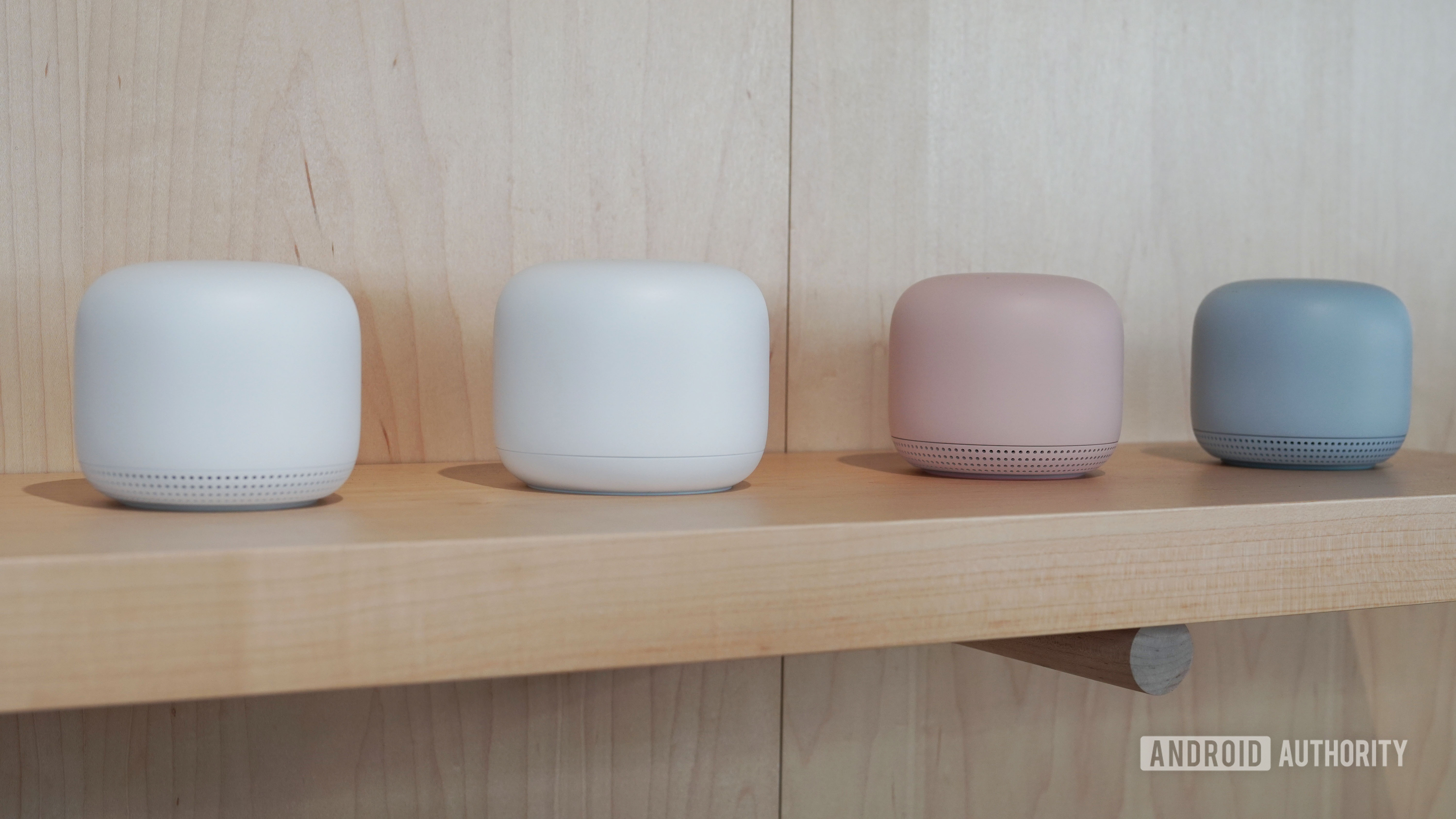 Google Nest Wi Fi color options on a shelf