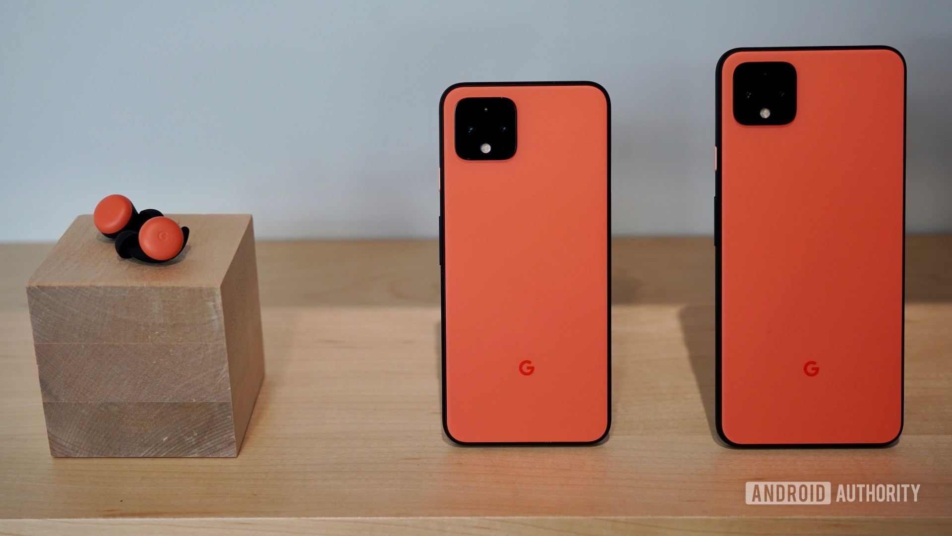 Google Pixel 4 orange with Pixel Buds