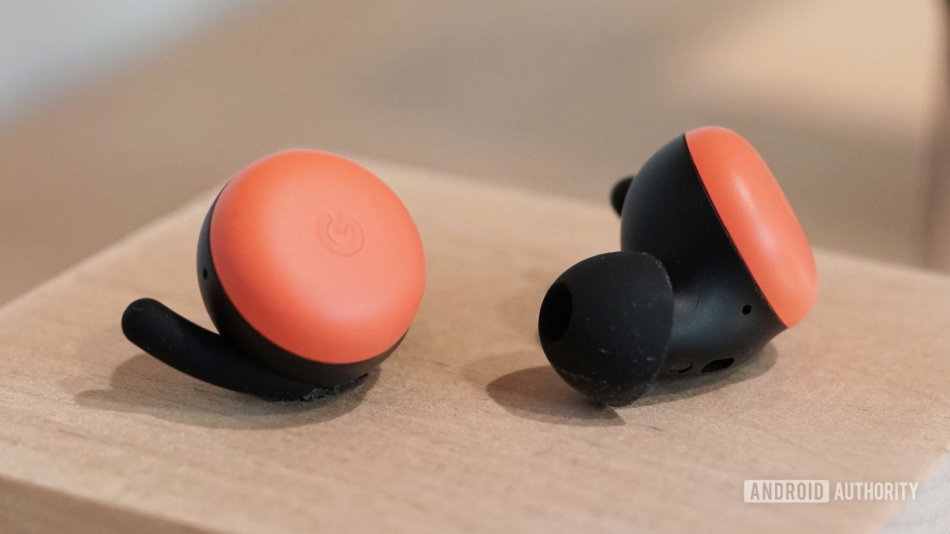 Google Pixel Buds 2 closeup in Oh So Orange