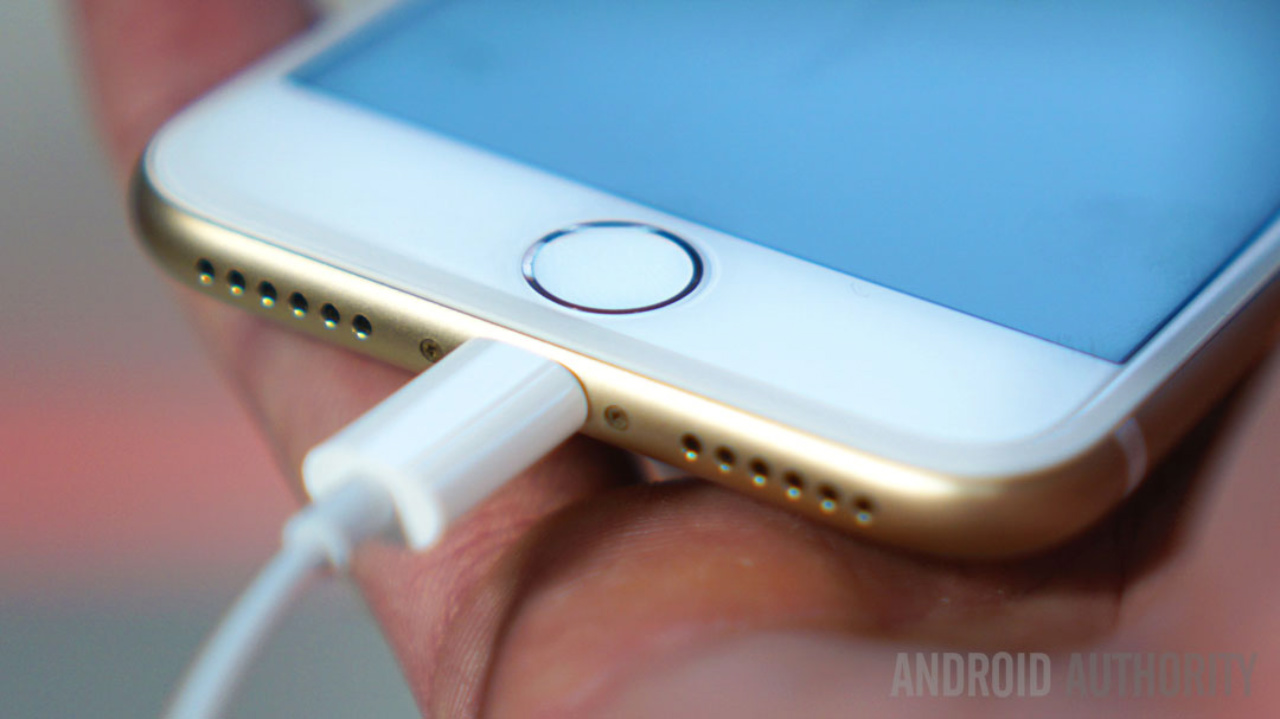 apple iphone attached to lightning cable
